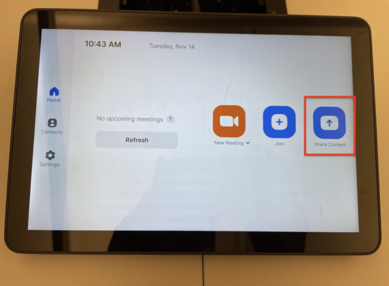 Image of the touch panel with the "Share content" button highlighted.